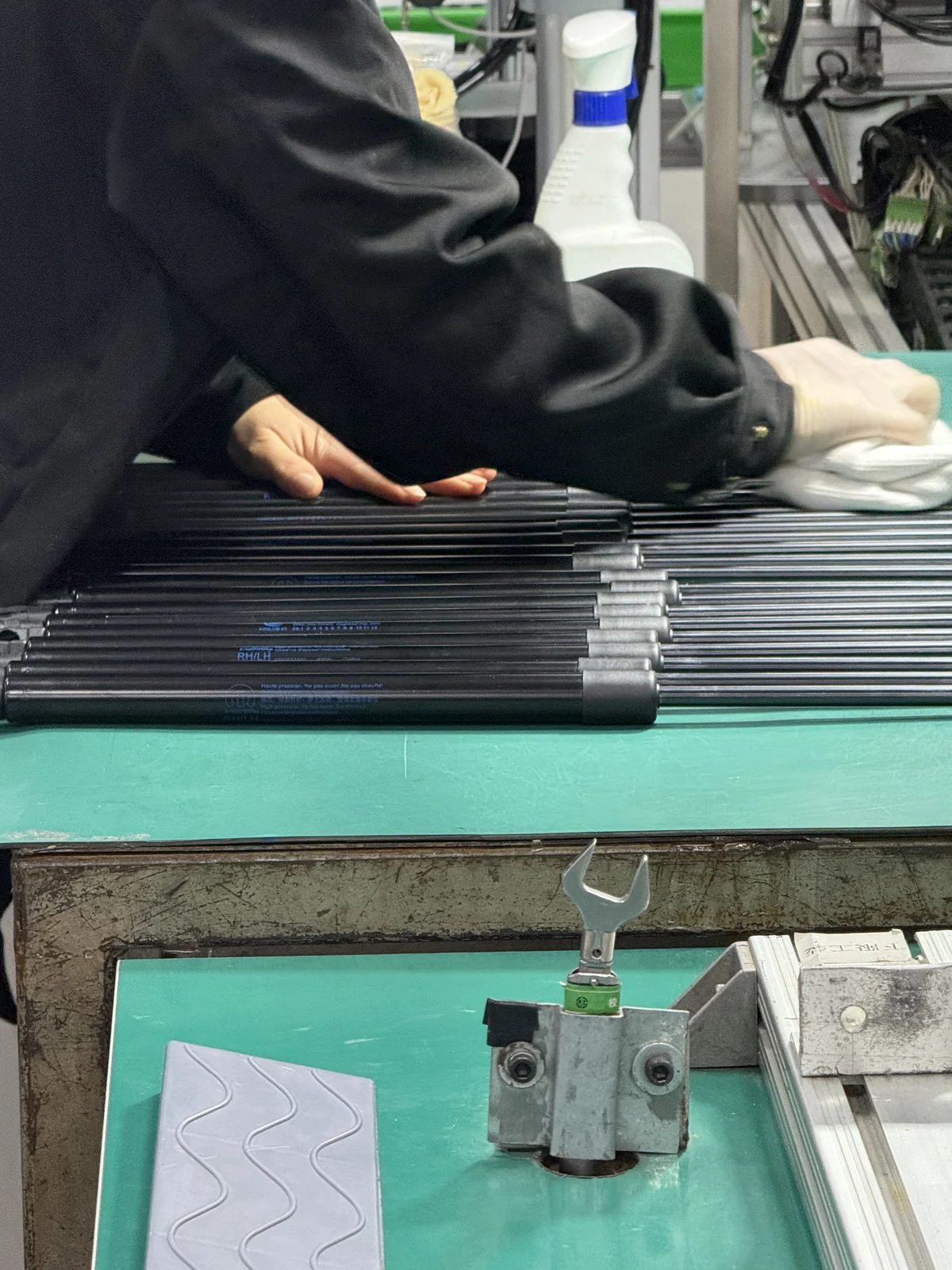 Finished gas spring assemblies on a workbench