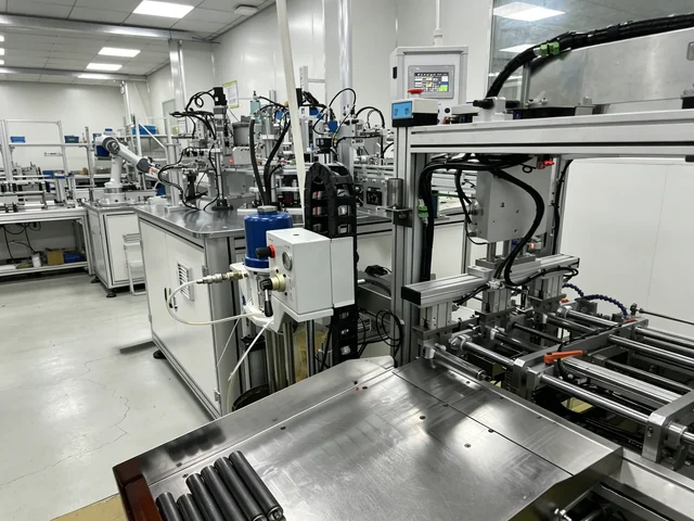 Assembly line and transfer stations