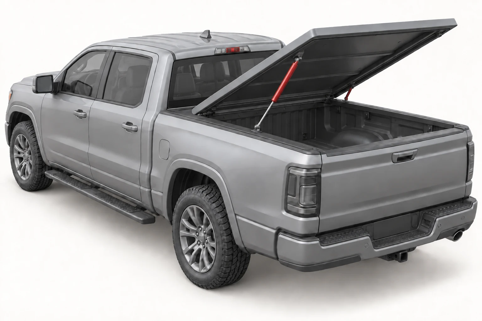 Complete pickup with gas springs attached between fixed bed rails and the open hard tonneau cover